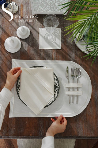 طقم مفارش سفرة - تصميم دورا - تطريز اوف وايت - قماش مقاوم للماء - ٦ اشخاص - ١٨ قطعة - طقم كامل  